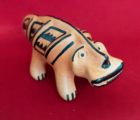 Orange Canoe Snake (Ela Chama Kamaluhai) by Indigenous artisans of Upper Xingu Territory